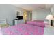 Bright bedroom featuring two beds, dresser with TV, and coastal decor at 9820 Queensway Blvd. # 301, Myrtle Beach, SC 29572