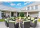 Outdoor fire pit with ample seating, perfect for relaxing and socializing in a peaceful setting at 9820 Queensway Blvd. # 301, Myrtle Beach, SC 29572
