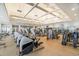 A spacious fitness center with rows of cardio machines, weight training equipment, and light wood flooring at 9820 Queensway Blvd. # 301, Myrtle Beach, SC 29572