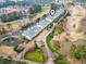 An elevated aerial view of condo community with a winding golf course landscape at 1017 World Tour Blvd. # 206, Myrtle Beach, SC 29579