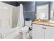 Bathroom featuring granite countertop, white vanity, and a combined tub and shower at 1017 World Tour Blvd. # 206, Myrtle Beach, SC 29579