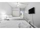 Well-lit bedroom featuring two cozy beds, a large closet, and a mounted television at 1017 World Tour Blvd. # 206, Myrtle Beach, SC 29579