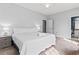Large bedroom featuring an entrance to a full bathroom and an exterior window at 1017 World Tour Blvd. # 206, Myrtle Beach, SC 29579