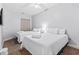 Bright bedroom with two double beds, soft neutral tones, and a ceiling fan at 1017 World Tour Blvd. # 206, Myrtle Beach, SC 29579