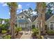 View of the gated clubhouse with a beautiful architectural style at 1017 World Tour Blvd. # 206, Myrtle Beach, SC 29579