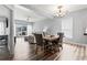 Dining area with table and chairs adjacent to the living room and kitchen at 1017 World Tour Blvd. # 206, Myrtle Beach, SC 29579