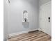 Hallway featuring a decorative inset shelf with a plant and wood-look flooring at 1017 World Tour Blvd. # 206, Myrtle Beach, SC 29579