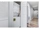 Convenient laundry room features stacked washer and dryer and storage at 1017 World Tour Blvd. # 206, Myrtle Beach, SC 29579