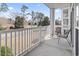 Open balcony with chairs overlooking a golf course and neighborhood at 1017 World Tour Blvd. # 206, Myrtle Beach, SC 29579
