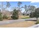 Overlooking an exterior view of green space and a pond at 1017 World Tour Blvd. # 206, Myrtle Beach, SC 29579