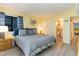 Comfortable bedroom with a cozy bed, charming decor, and easy access to the bathroom at 105 S Ocean Blvd. # 108, North Myrtle Beach, SC 29582