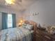 Serene bedroom featuring nautical decorations, soft lighting, and a comfortable bed at 1058 Sea Mountain Hwy. # 14-203, North Myrtle Beach, SC 29582