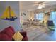 Cozy living room with stylish striped sofas and nautical-themed decor at 1058 Sea Mountain Hwy. # 14-203, North Myrtle Beach, SC 29582