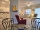 Inviting open floor plan with a view from the dining area to the living room at 1058 Sea Mountain Hwy. # 14-203, North Myrtle Beach, SC 29582