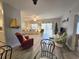 Bright open floor plan showcasing the living room's cozy seating and cheerful decor at 1058 Sea Mountain Hwy. # 14-203, North Myrtle Beach, SC 29582