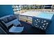 Balcony overlooking the inviting pool area, complete with comfortable seating for relaxation at 1600 Ocean Blvd. S # 226, Myrtle Beach, SC 29577