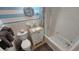 The bathroom features a shower and tub combination, toilet and vanity at 1600 Ocean Blvd. S # 226, Myrtle Beach, SC 29577