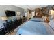 Comfortable bedroom with two inviting beds, a television, and stylish coastal decorations at 1600 Ocean Blvd. S # 226, Myrtle Beach, SC 29577
