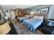 Cozy bedroom featuring two beds, rustic wood decor, and a welcoming ambiance at 1600 Ocean Blvd. S # 226, Myrtle Beach, SC 29577