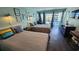 Inviting living area with two beds and access to a private balcony at 1600 S Ocean Blvd. # 326, Myrtle Beach, SC 29577