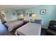 Comfortable living space with two beds and stylish nautical decor at 1600 S Ocean Blvd. # 326, Myrtle Beach, SC 29577