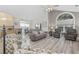 Bright living room with open layout, connecting to the kitchen and dining area at 1604 Cottage Cove Circle, North Myrtle Beach, SC 29582