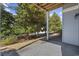 Outdoor patio area with view of surrounding trees at 1604 Cottage Cove Circle, North Myrtle Beach, SC 29582