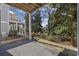 Outdoor patio area with view of backyard and upper deck at 1604 Cottage Cove Circle, North Myrtle Beach, SC 29582