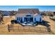 Back of the house with outdoor patio, summer kitchen, and screened porch offer outdoor living at 1606 Lake Egret Dr., North Myrtle Beach, SC 29582