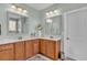 Well-lit bathroom with double vanity sinks and spacious cabinets for storage at 1606 Lake Egret Dr., North Myrtle Beach, SC 29582