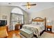 Comfortable bedroom featuring a bed, desk, and a large window at 1606 Lake Egret Dr., North Myrtle Beach, SC 29582