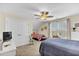 This bedroom features carpet, a ceiling fan, and two beds with patterned comforters at 1606 Lake Egret Dr., North Myrtle Beach, SC 29582