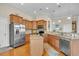 Spacious kitchen boasts stainless steel appliances, granite countertops, and a central island at 1606 Lake Egret Dr., North Myrtle Beach, SC 29582
