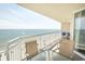 This balcony offers a stunning ocean view with comfortable seating at 1625 S Ocean Blvd. # 1109, North Myrtle Beach, SC 29582