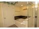 This bright bathroom has a jacuzzi tub, shower, and beachy ceiling at 1625 S Ocean Blvd. # 1109, North Myrtle Beach, SC 29582