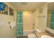 Bathroom with granite countertop, seashell-themed curtain, and shower-tub combo at 1625 S Ocean Blvd. # 1109, North Myrtle Beach, SC 29582