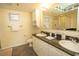 This spacious bathroom has a double vanity and a shower at 1625 S Ocean Blvd. # 1109, North Myrtle Beach, SC 29582