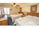 Comfortable bedroom featuring two beds, light walls, dresser with mirror and a window for natural light at 1625 S Ocean Blvd. # 1109, North Myrtle Beach, SC 29582