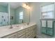 Well-lit bathroom featuring a double sink vanity with plenty of counter space and cabinet storage at 206 Marley Ct., Conway, SC 29526