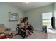 Bedroom with exercise equipment, a window and light-blue walls at 206 Marley Ct., Conway, SC 29526