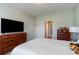 Serene bedroom featuring a large television, providing the perfect blend of comfort and entertainment at 206 Marley Ct., Conway, SC 29526