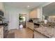 Gourmet kitchen with granite countertops and stainless steel appliances provides a modern aesthetic at 206 Marley Ct., Conway, SC 29526