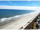 Scenic beach view with waves gently rolling onto the sandy shore at 2201 S Ocean Blvd. # 1603, Myrtle Beach, SC 29577