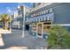 Charming Ben & Jerry's storefront with inviting blue and white awning, offering sweet treats for all at 2201 S Ocean Blvd. # 1603, Myrtle Beach, SC 29577