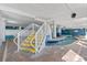 Indoor lazy river with stairs and safety signs, ideal for relaxation and recreation at 2201 S Ocean Blvd. # 1603, Myrtle Beach, SC 29577