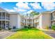 Attractive multi-Gathering residential building showcasing balconies, green space, and inviting architecture at 2203 Sweetwater Blvd. # 2203, Murrells Inlet, SC 29576
