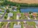 Aerial view of a neighborhood featuring a lake and nicely landscaped homes at 286 Bonnie Bridge Circle, Myrtle Beach, SC 29579
