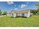 Backyard featuring well-maintained landscaping and a manicured lawn at 286 Bonnie Bridge Circle, Myrtle Beach, SC 29579