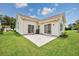 Backyard featuring a concrete patio and a view of the home's siding at 286 Bonnie Bridge Circle, Myrtle Beach, SC 29579