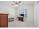 Neutral bedroom with a ceiling fan, a large window, and comfortable carpet at 286 Bonnie Bridge Circle, Myrtle Beach, SC 29579